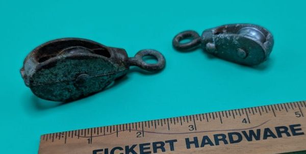 Two Small Vintage Pulleys
