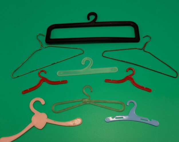 cropped-PXL_20261004_191215065-scaled-1.jpg Lot of 9 vintage Miniature Doll Hangars - Image 1